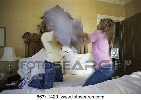 people, bed, teens, pillows, indoors, female View Large Photo Image Stock Photo - people, bed, teens, pillows, indoors, female. Fotosearch