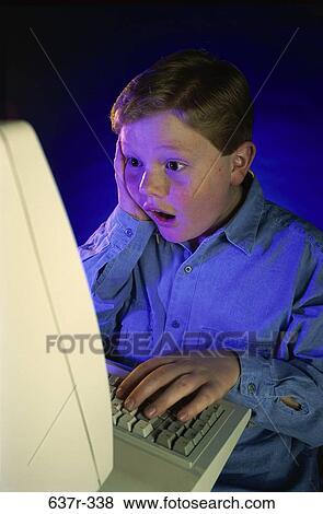 people, computer, reading, boy, awe, child, surprise View Large Photo Image Stock Photo - people, computer, reading, boy, awe, child, surprise. Fotosearch