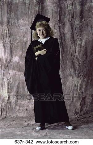Stock Image - people, girl, cap, education, brunette, graduation. Fotosearch