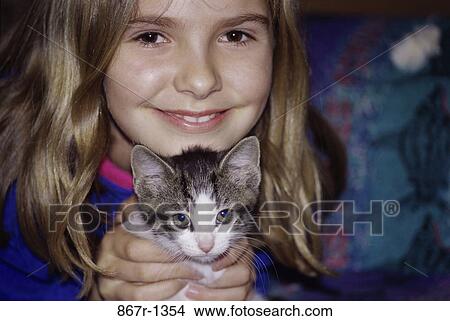 people, kitten, pet, holding, girl, child, brunette View Large Photo Image Picture - people, kitten, pet, holding, girl, child, brunette. Fotosearch
