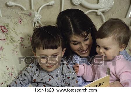 people, mother, reading, book, nurturing, family View Large Photo Image Stock Image - people, mother, reading, book, nurturing, family. Fotosearch
