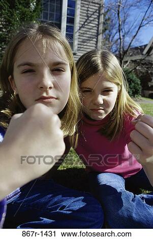 people, outdoors, teens, fight, mean, Caucasian View Large Photo Image Stock Image - people, outdoors, teens, fight, mean, Caucasian. Fotosearch