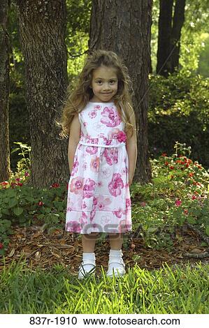 people, plants, smiling, girl, trees, outdoors, smile View Large Photo Image Stock Image - people, plants, smiling, girl, trees, outdoors, smile. Fotosearch