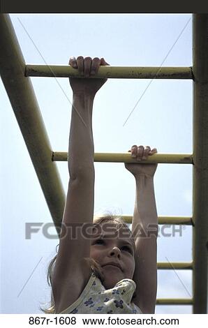 people, playing, hanging, girl, playground, outdoors, strength View Large Photo Image Stock Photo - people, playing, hanging, girl, playground, outdoors, strength. Fotosearch