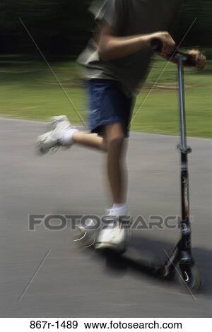 people, playing, riding, boy, motion, outdoors, speed View Large Photo Image Stock Photo - people, playing, riding, boy, motion, outdoors, speed. Fotosearch