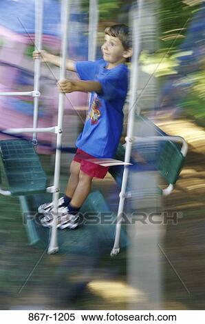 people, playing, swinging, swing, boy, summer, motion View Large Photo Image Stock Photography - people, playing, swinging, swing, boy, summer, motion. Fotosearch