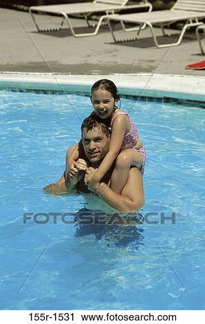 Stock Image - people, pool, playing, swimming, beach, laughing, playful. Fotosearch