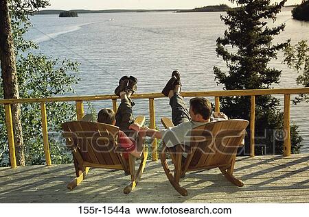 people, relaxation, water, railing, rocking, talking View Large Photo Image Stock Image - people, relaxation, water, railing, rocking, talking. Fotosearch