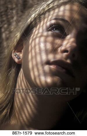 people, shadows, woman, face, serious, blond, contemplating View Large Photo Image Stock Photo - people, shadows, woman, face, serious, blond, contemplating. Fotosearch