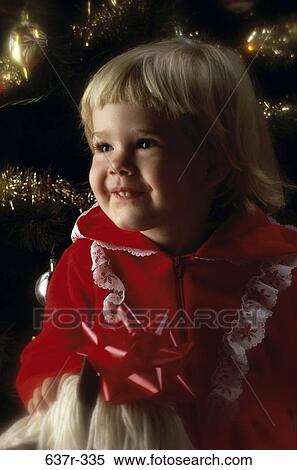 people, smiling, Christmas, girl, smile, child, ribbon View Large Photo Image Stock Photography - people, smiling, Christmas, girl, smile, child, ribbon. Fotosearch