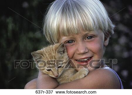 people, smiling, kitten, cat, pet, girl View Large Photo Image Stock Photo - people, smiling, kitten, cat, pet, girl. Fotosearch