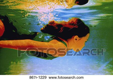 Stock Photo - people, swim, pool, swimming, girl, child, brunette. Fotosearch