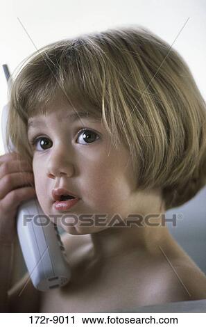Stock Image - people, telephone, talking, listening, conversation, phone, girl. Fotosearch