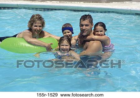 people, wading, pool, smiling, swimming, beach View Large Photo Image Stock Photo - people, wading, pool, smiling, swimming, beach. Fotosearch