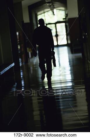 people, walking, briefcase, teacher, school, hallway View Large Photo Image Stock Image - people, walking, briefcase, teacher, school, hallway. Fotosearch