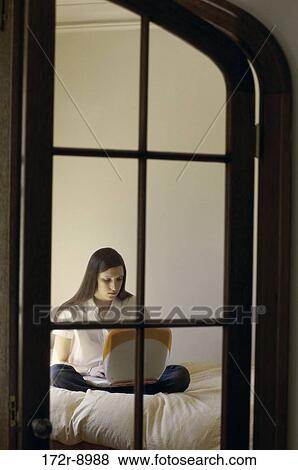 people, window, computer, laptop, concentrating, using, brunette View Large Photo Image Stock Photo - people, window, computer, laptop, concentrating, using, brunette. Fotosearch