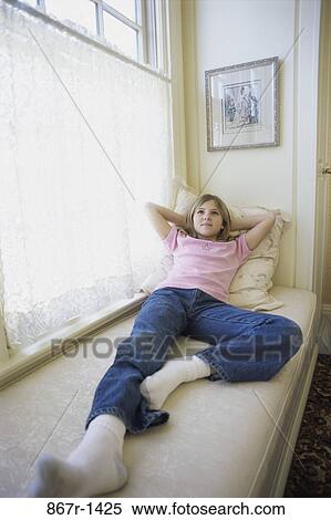 people, window, laying, indoors, teenager View Large Photo Image Stock Photography - people, window, laying, indoors, teenager. Fotosearch