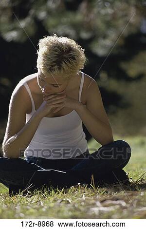 people, woman, ground, sitting, outdoors, moods View Large Photo Image Stock Photo - people, woman, ground, sitting, outdoors, moods. Fotosearch