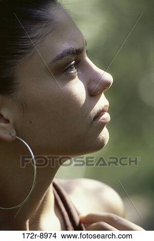 people, woman, profile, daydreaming, earring, outdoors, serious View Large Photo Image Picture - people, woman, profile, daydreaming, earring, outdoors, serious. Fotosearch