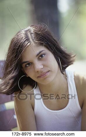 people, woman, staring, Hispanic, outdoors, serious, posing View Large Photo Image Stock Photography - people, woman, staring, Hispanic, outdoors, serious, posing. Fotosearch