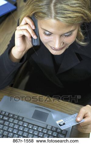 people, woman, telephone, computer, laptop, phone, shopping View Large Photo Image Stock Photo - people, woman, telephone, computer, laptop, phone, shopping. Fotosearch