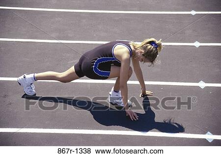 people, woman, track, outdoors, Caucasian, sport, position View Large Photo Image Stock Photo - people, woman, track, outdoors, Caucasian, sport, position. Fotosearch