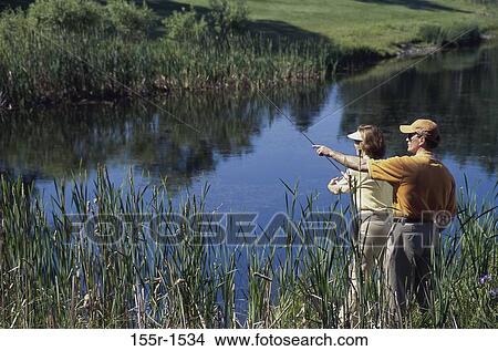 reeds, people, relaxation, couple, sunglasses, pointing View Large Photo Image Picture - reeds, people, relaxation, couple, sunglasses, pointing. Fotosearch