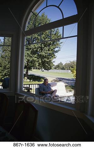 relaxed, people, relaxation, window, senior, reading View Large Photo Image Stock Photograph - relaxed, people, relaxation, window, senior, reading. Fotosearch