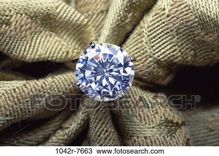 Stock Image - setting, jewelry, indulgence, wealth, cut, fabric. Fotosearch