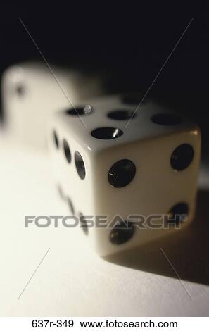 Stock Photo - shadow, risk, still life, gambling, dice, dots. Fotosearch
