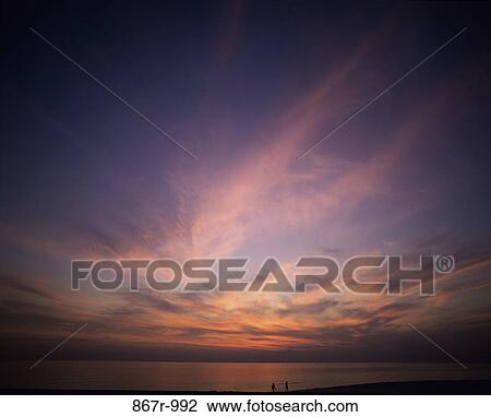 sky, clouds, couple, sunset, beach, nature, inspirational View Large Photo Image Stock Image - sky, clouds, couple, sunset, beach, nature, inspirational. Fotosearch
