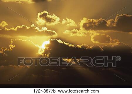 Stock Image - sky, clouds, sun, nature, Suns nature. Fotosearch