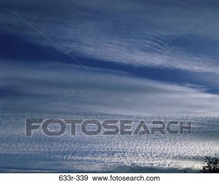 sky, floating, clouds, cloudy, wispy, nature, atmosphere View Large Photo Image Stock Photo - sky, floating, clouds, cloudy, wispy, nature, atmosphere. Fotosearch