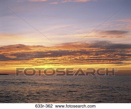 sky, water, clouds, ocean, sunset, nature View Large Photo Image Stock Image - sky, water, clouds, ocean, sunset, nature. Fotosearch