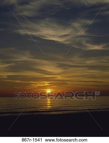 sky, water, clouds, sun, dusk, evening, city View Large Photo Image Stock Image - sky, water, clouds, sun, dusk, evening, city. Fotosearch