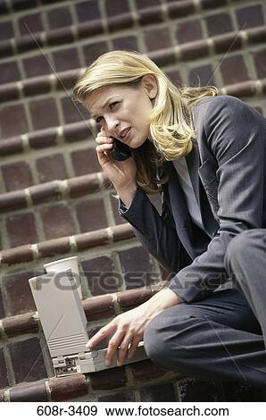 woman, telephone, talking, listening, sitting, computer, laptop View Large Photo Image Stock Photo - woman, telephone, talking, listening, sitting, computer, laptop. Fotosearch