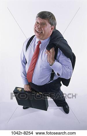 Picture - briefcase, business, Middle-aged, suspenders, humor, businessman. Fotosearch