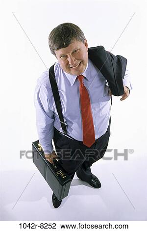 briefcase, business, Middle-aged, suspenders, businessman, indoors View Large Photo Image Stock Image - briefcase, business, Middle-aged, suspenders, businessman, indoors. Fotosearch