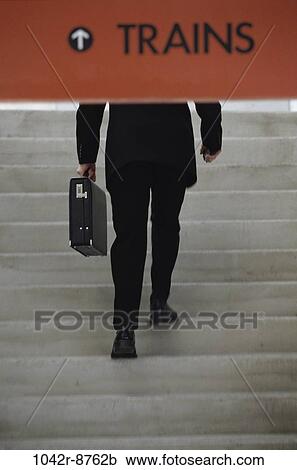 briefcase, business, outdoors, sign, station, businessman View Large Photo Image Stock Image - briefcase, business, outdoors, sign, station, businessman. Fotosearch