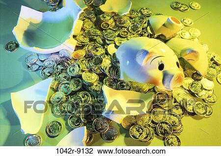 Stock Image - broken, finance, still life, personal finance, bank, coins, piggy bank. Fotosearch