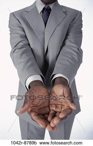 Stock Image - business, businessman, indoors, anticipating, metaphor, African-American. Fotosearch