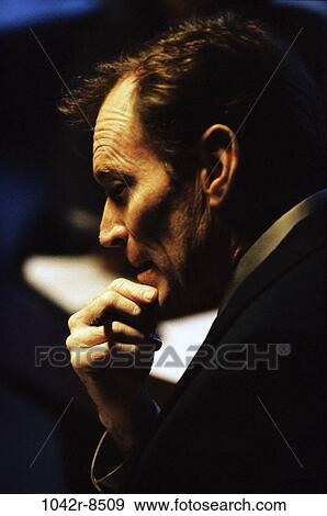 Stock Photo - business, Middle-aged, contemplating, businessman, indoors, contemplate. Fotosearch