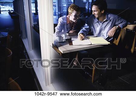 business, Middle-aged, writing, restaurant, planning, forms, drinks View Large Photo Image Stock Photo - business, Middle-aged, writing, restaurant, planning, forms, drinks. Fotosearch