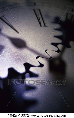 Stock Image - clock, industry, time, gears, industrial, background, still life. Fotosearch