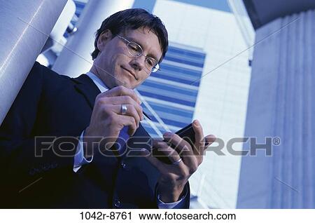 computer, business, outdoors, Middle-aged, using, businessman, component View Large Photo Image Stock Image - computer, business, outdoors, Middle-aged, using, businessman, component. Fotosearch