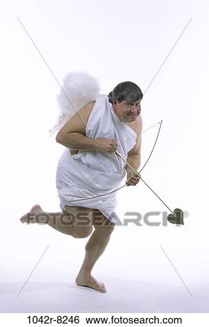 Stock Photograph - Cupid, humor, love, mischievous, humorous, bow, arrow. Fotosearch