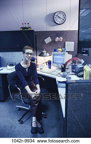 Picture - desk, woman, computer, business, casual, indoors, Caucasian. Fotosearch