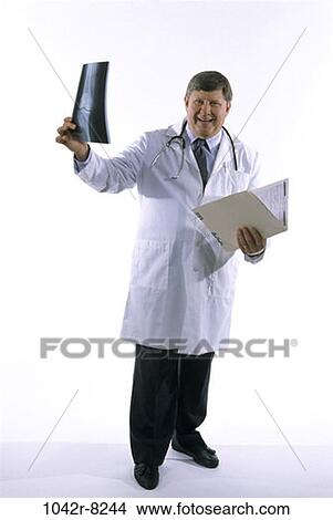 doctor, chart, medicine, Middle-aged, medical, indoors View Large Photo Image Picture - doctor, chart, medicine, Middle-aged, medical, indoors. Fotosearch