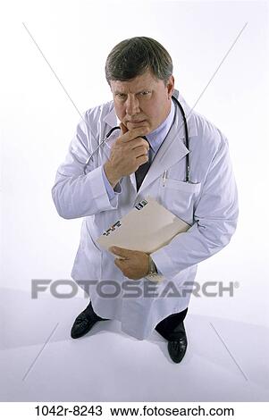 doctor, medicine, Middle-aged, contemplation, medical, indoors View Large Photo Image Stock Image - doctor, medicine, Middle-aged, contemplation, medical, indoors. Fotosearch
