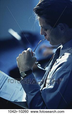 eyeglasses, business, serious, businessman, indoors, travel View Large Photo Image Stock Image - eyeglasses, business, serious, businessman, indoors, travel. Fotosearch